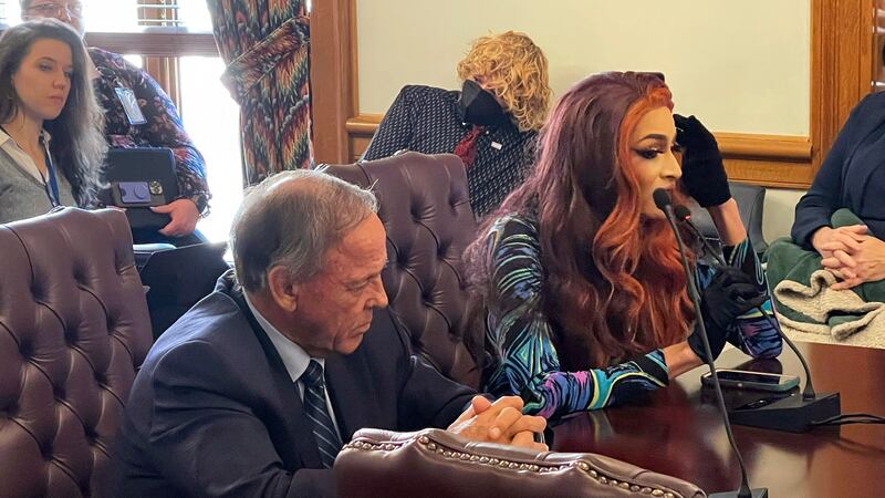Drag performer MD Hunter, whose stage name is Athena Sinclair, testifies before a state Senate...