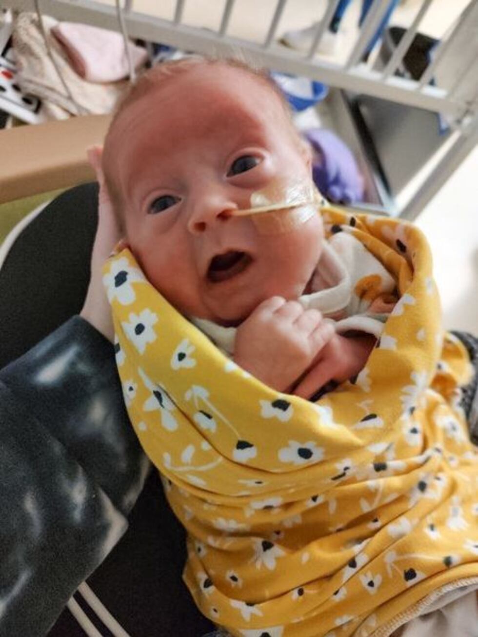 Four days after Layla’s birth, the surgical team removed the tumor from her neck, which was...