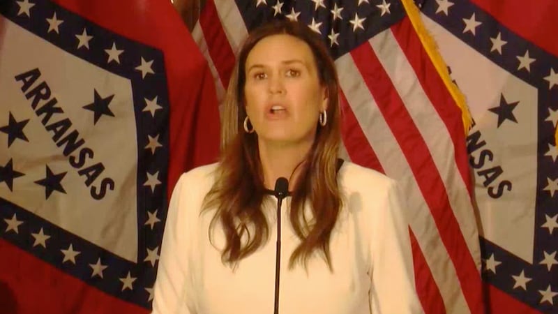 Arkansas Gov. Sarah Huckabee Sanders, along with state Sen. Jonathan Dismand and state Rep....