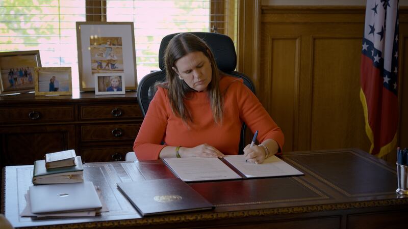 Governor Sarah Huckabee Sanders plans to provide state aid to schools for rising insurance rates