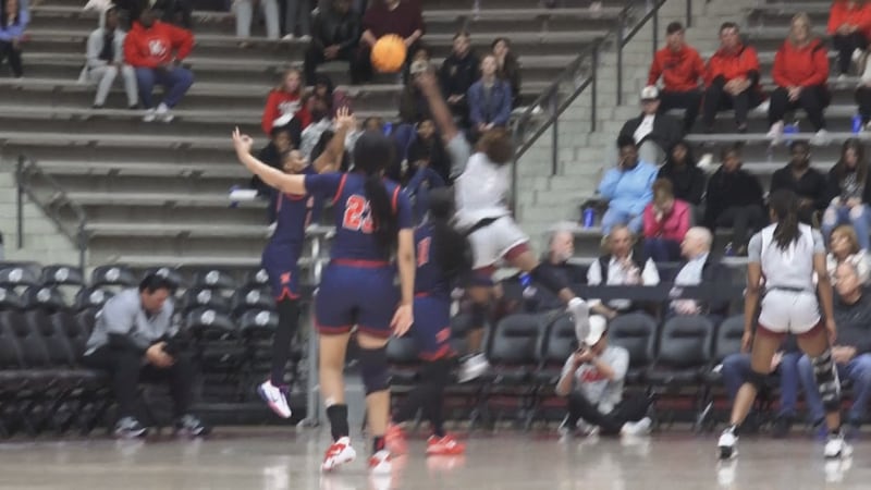 Nettleton alum Elauna Eaton celebrates as Destiny Salary drills a three Sunday.