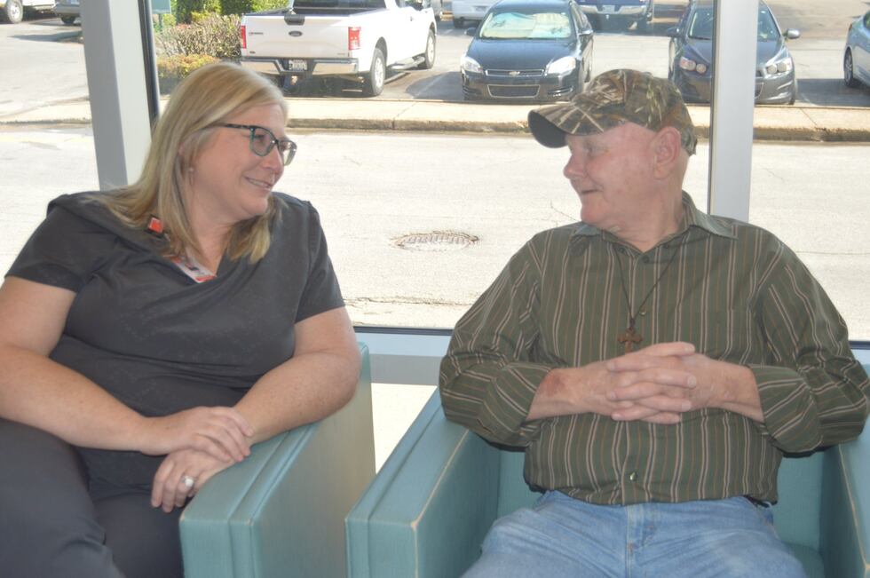 Angie Brady and Aubrey Cook talk recently. Brady is Cook's patient care navigator, helping...