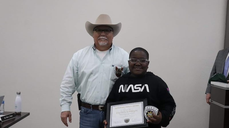 Davyon Johnson, 11, was honored for his Dec. 9 actions to help both a choking classmate and a...