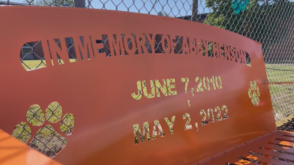 The garden features new picnic tables, flowers, butterflies, and a new Bobcat-orange bench.
