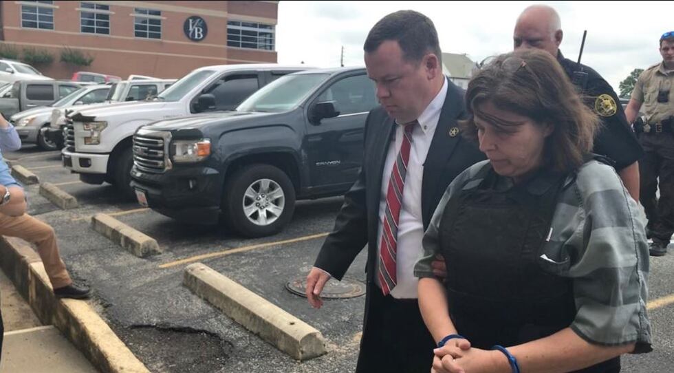 Rebecca Lynn O'Donnell being led into the Randolph County Courthouse for her probable cause...