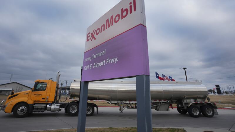 A tanker pulls into an ExxonMobil fuel storage and distribution facility in Irving, Texas,...